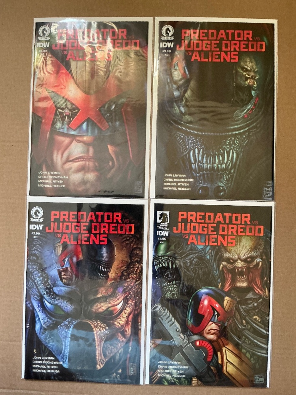 Predator vs. Judge Dredd vs. Aliens #1–4 Dark Horse Comics / IDW Publishing
